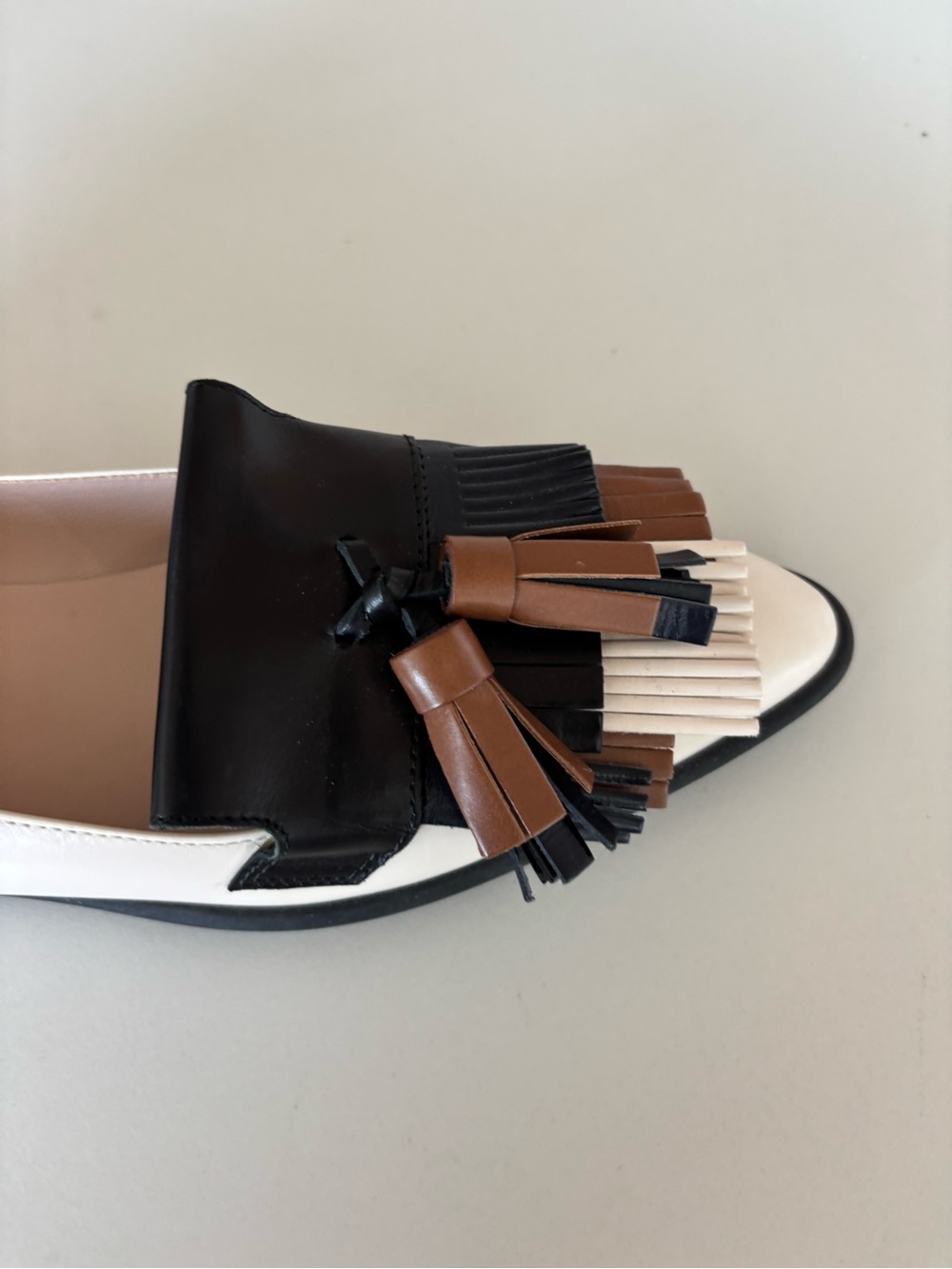 TOD'S Two-Tone Cream, Black & Brown Tassel Loafers - Picture 6 of 6